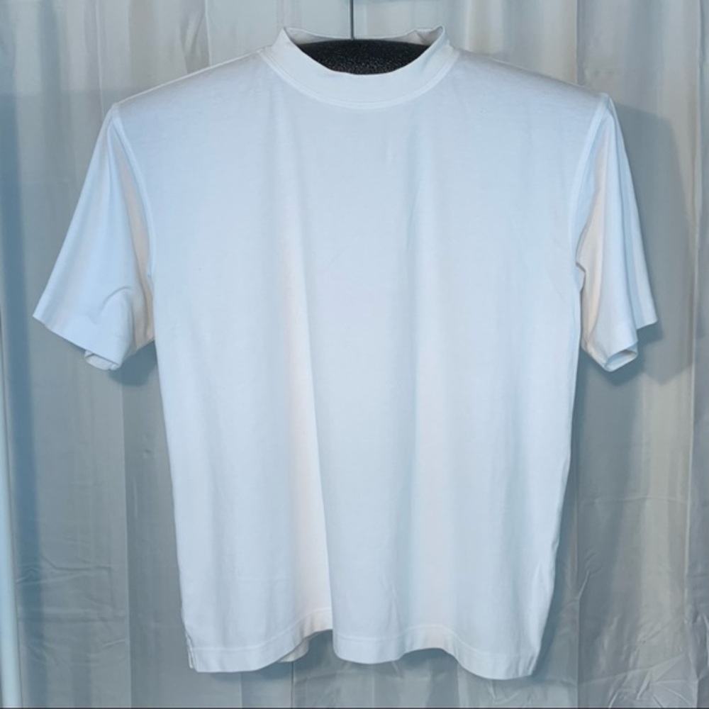 Perrin Wear white shirt sleeve tee shirt.